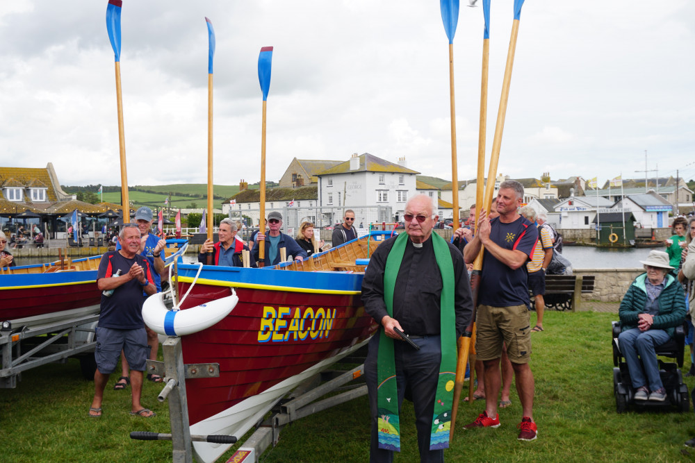 The Reverend Phil Ringer blessing Beacon