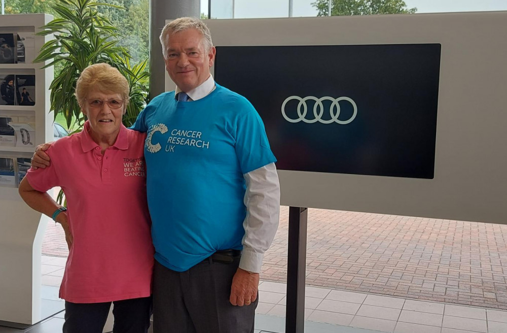 Crewe and Nantwich Cancer Research Representative Margaret Grindrod pictured with Swansway Motor Group Director David Smyth. (Image - Swansway Group)