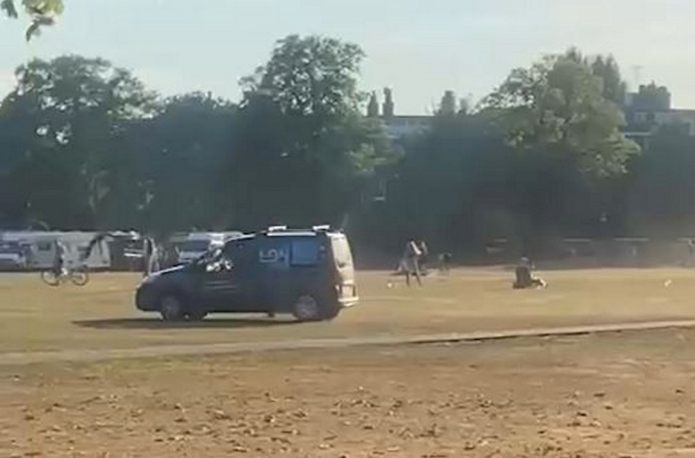 Footage shows a van driving around the traveler camp on Richmond Green last week. (Photo Credit: Alicia via SWNS).