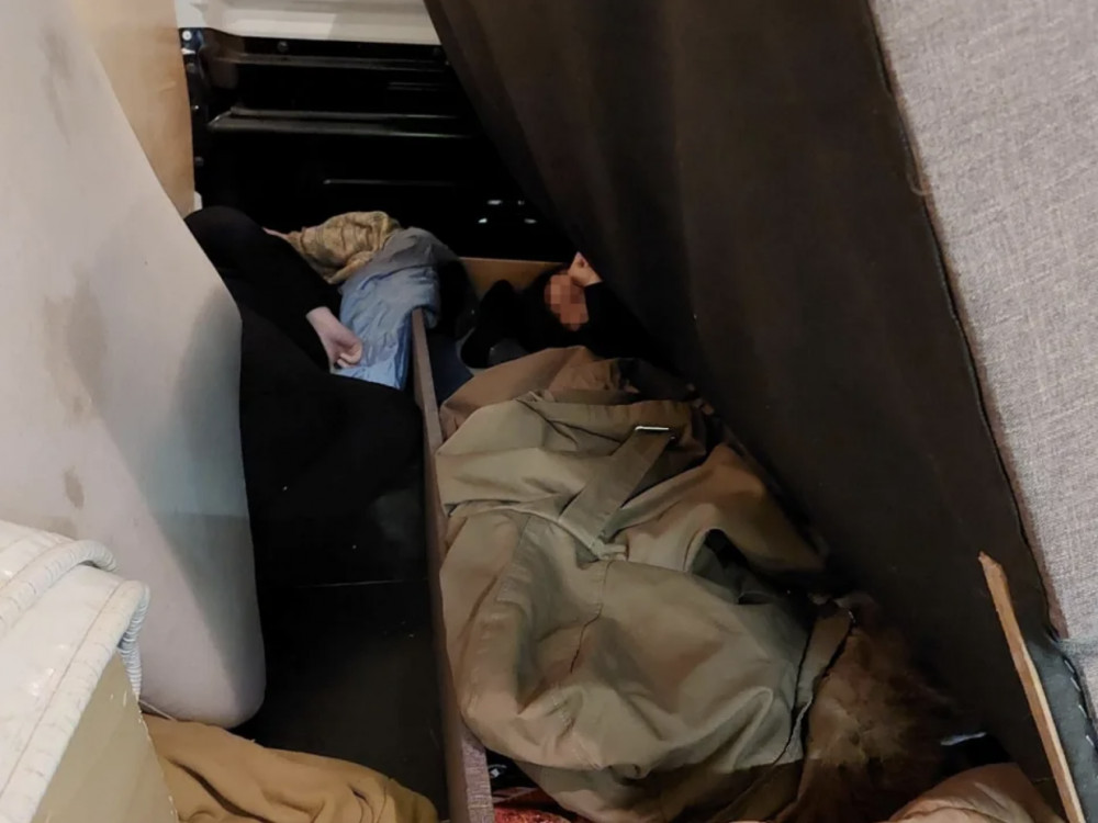 The Vietnamese migrants were smuggled inside sofas and hidden behind other furniture (credit: SWNS). The Vietnamese migrants were smuggled inside sofas and hidden behind other furniture (credit: SWNS).