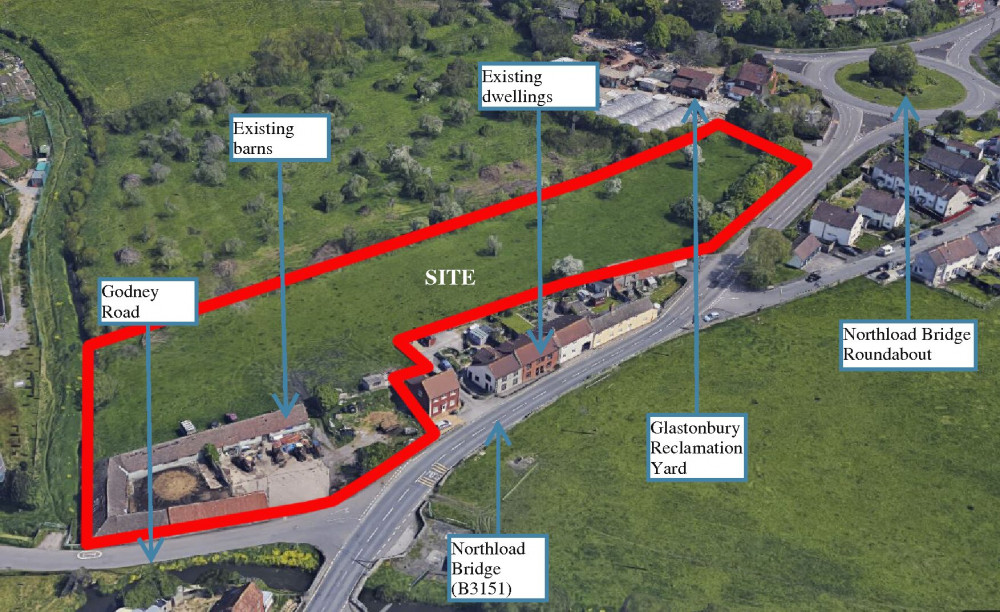 The planning application sought to build 27 new homes on a greenfield site and involved demolishing existing commercial barns. 