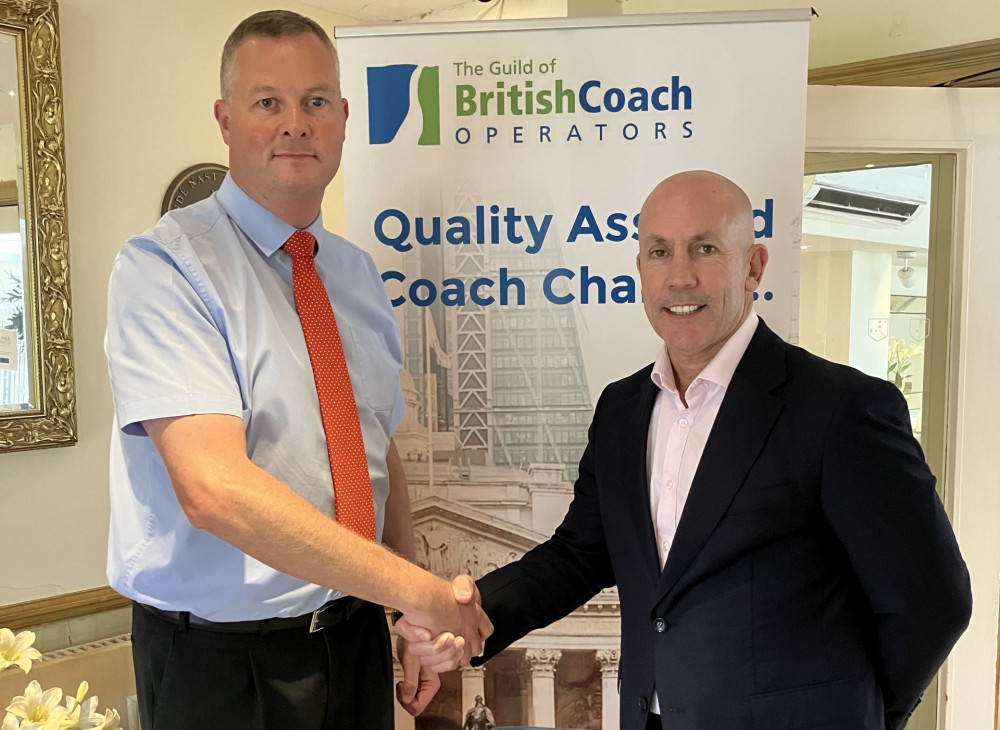 Anthony Wilson (left), Chair of the Guild of British Coach Operators, with Belle Vue managing director Phil Hitchens (Image - Belle Vue) Anthony Wilson (left), Chair of the Guild of British Coach Operators, with Belle Vue managing director Phil Hitchens (Image - Belle Vue)