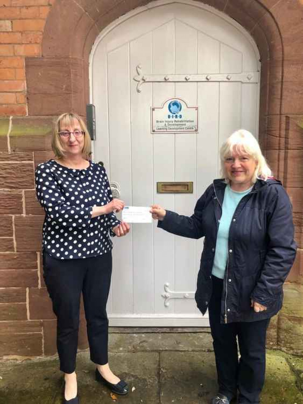 The Frodsham Sings fundraiser team, Caroline and Vicky, presenting the BIRD cheque. Image: Frodsham Sings Community Choir The Frodsham Sings fundraiser team, Caroline and Vicky, presenting the BIRD cheque. Image: Frodsham Sings Community Choir