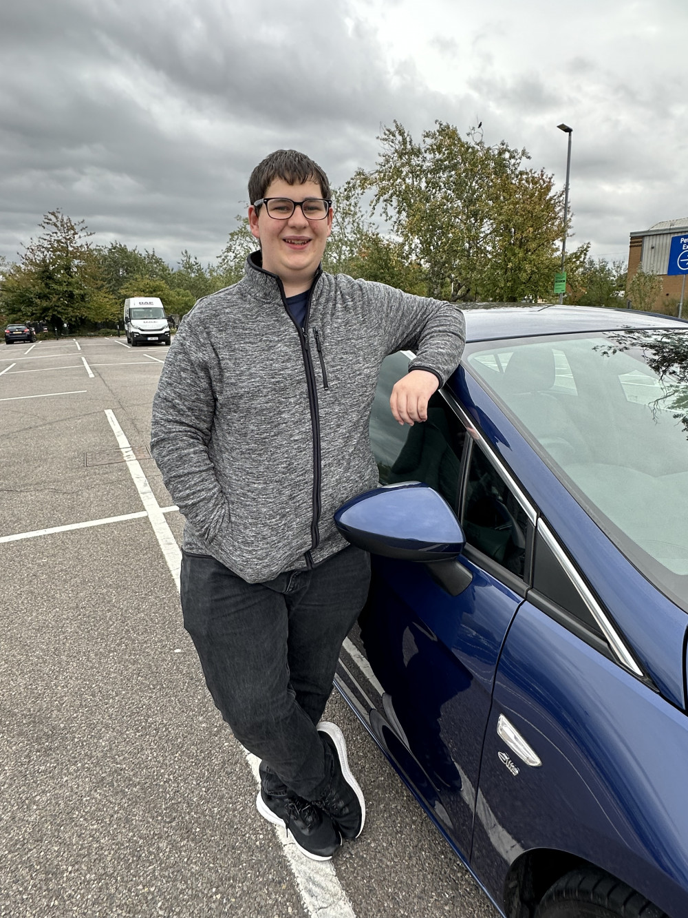 Jamie Rodwell alongside his car