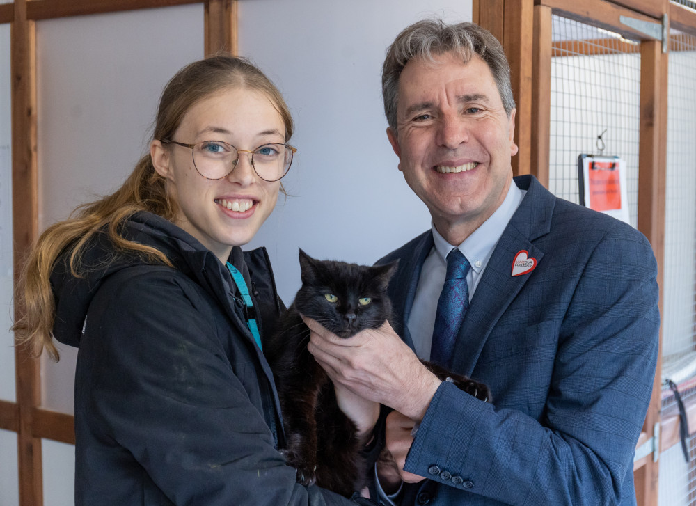 Mayor Norris at Bath College with Tosca the black cat and student Anna Colbourne