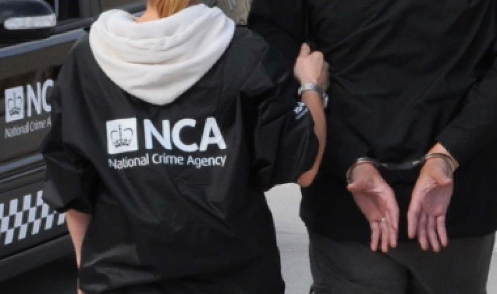 Three arrested by the NCA as they are suspected of people smuggling into the UK using small boats (credit: NCA). 