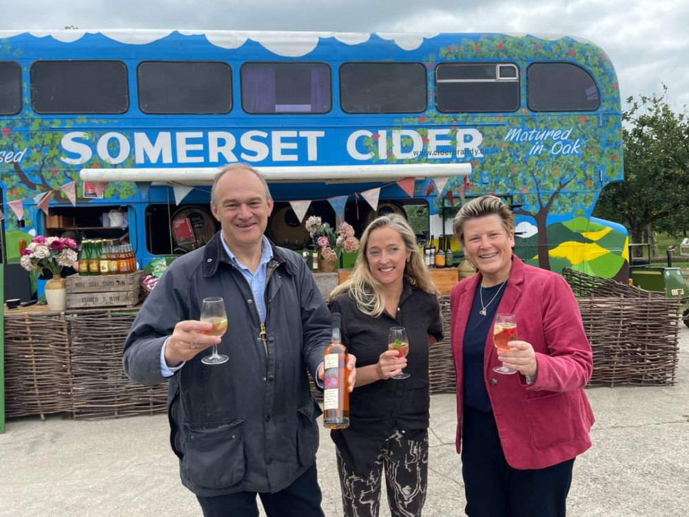 Sarah Dyke MP (right) at Burrow Hill Farm, alongside Lib Dem leader Sir Ed Davey and Matilda Temperley (centre)