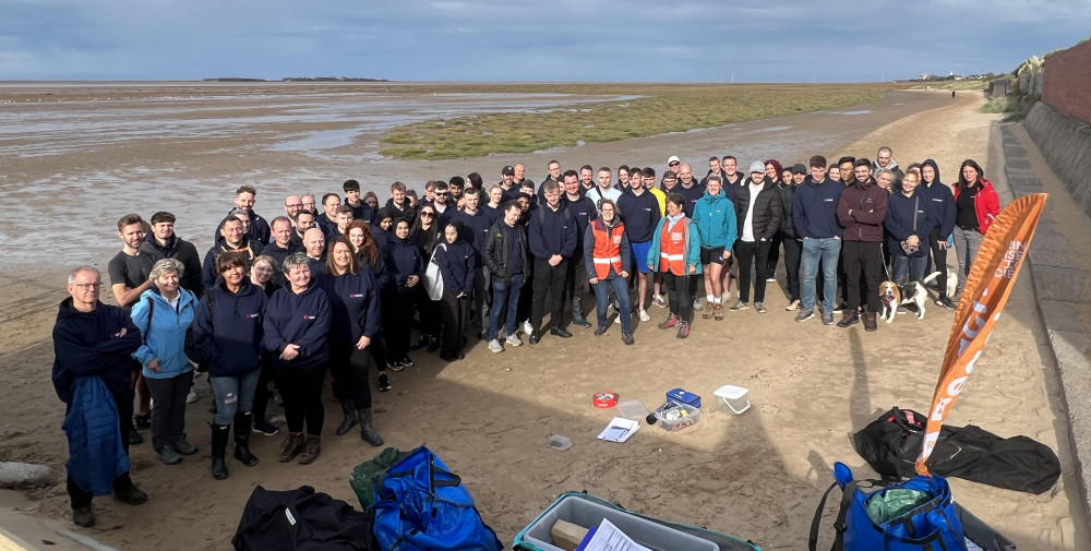 68 staff members from Stockport-based accountancy firm HURST took part in a clean-up of West Kirby beach (Image - HURST)