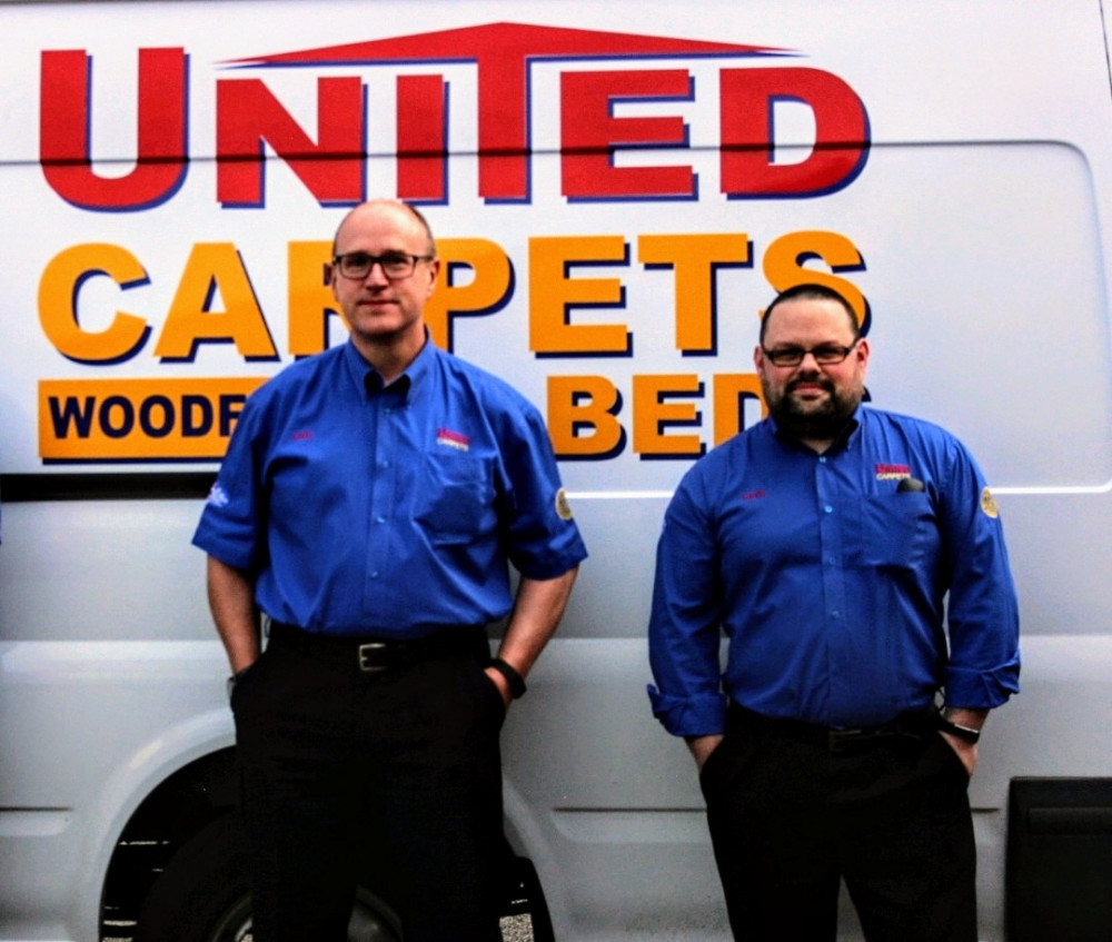 United Carpets owner, Eddie Davies (left), with assistant manager, Gavin Chesters (right) (Nub News). 