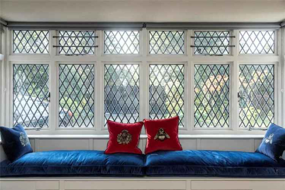 A close-up of the velvet window seats in the living room