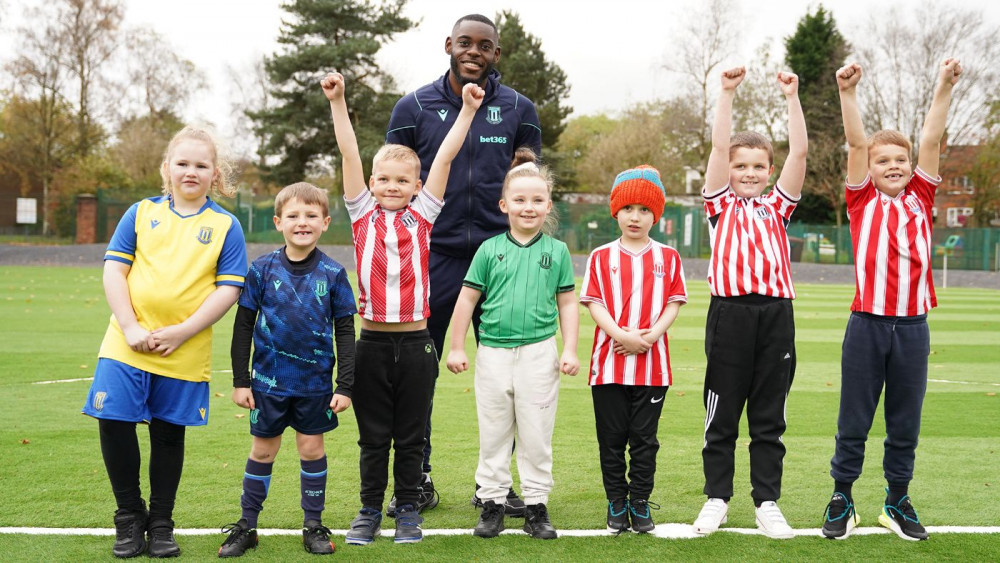 Stoke City FC defender, Junior Tchamadeu, visited Sandon Primary Academy in Meir yesterday (Stoke City).