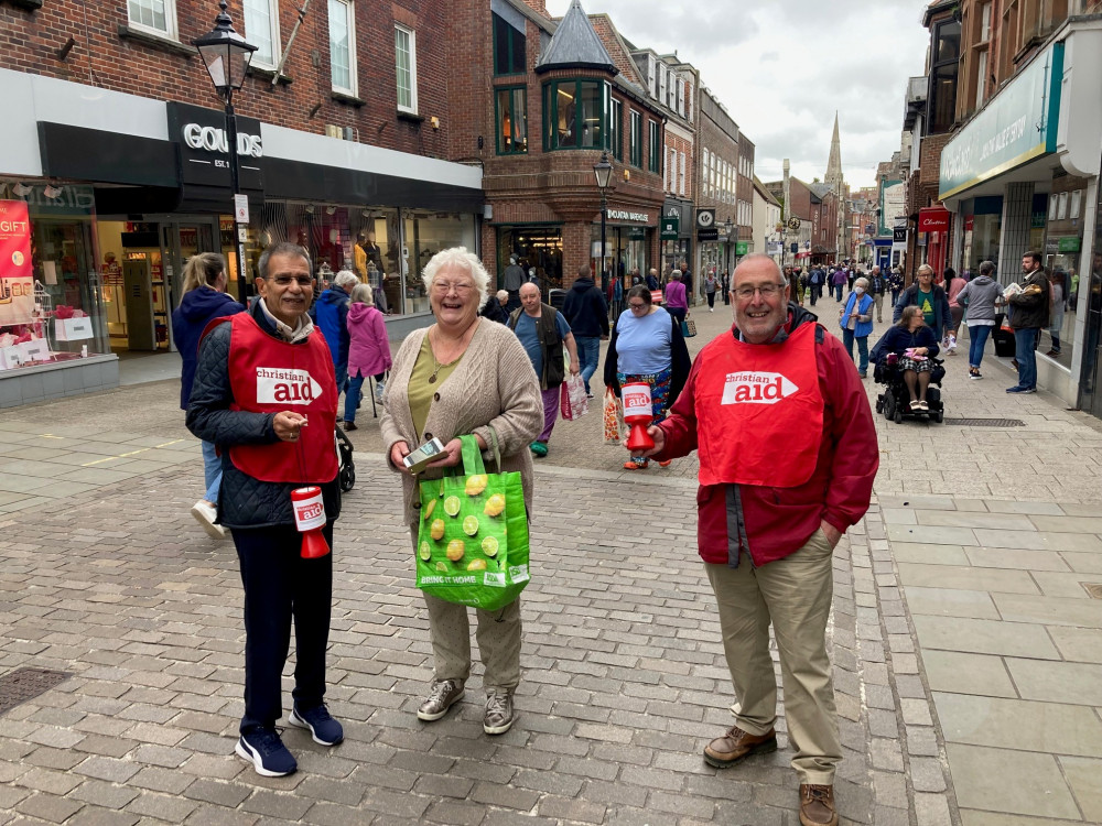 Peter Green pictured left street collecting for Christian Aid