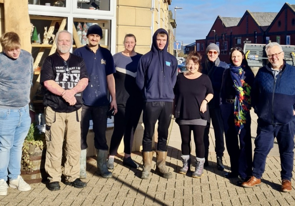 The team at Coalville CAN with some of the QMS workers outside the Memorial Square offices. Photos: Supplied.