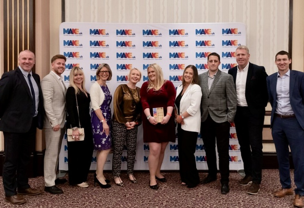 Isabella Walsh (centre) after winning her award in Birmingham. Photo: Make UK