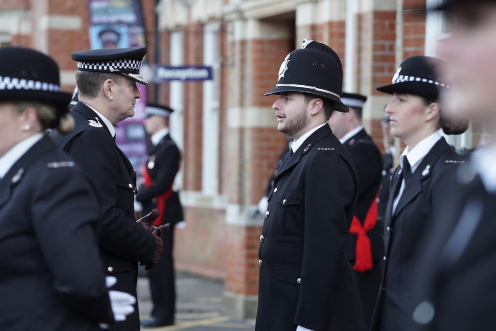 CC Ben-Julian Harrington speaks to one of the new officers