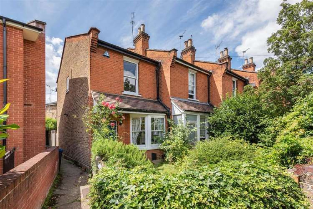 This charming redbrick cottage is located on a 'peaceful' footpath in Surbiton (Image: Matthew James)