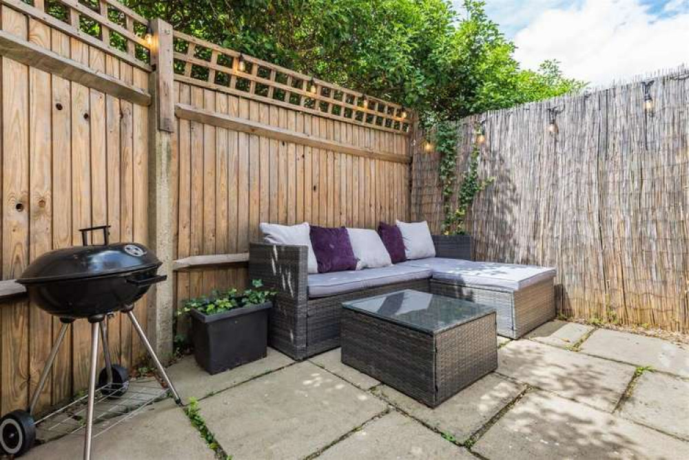 The back garden, perfect for a relaxed outdoor barbecue (Image: Matthew James)