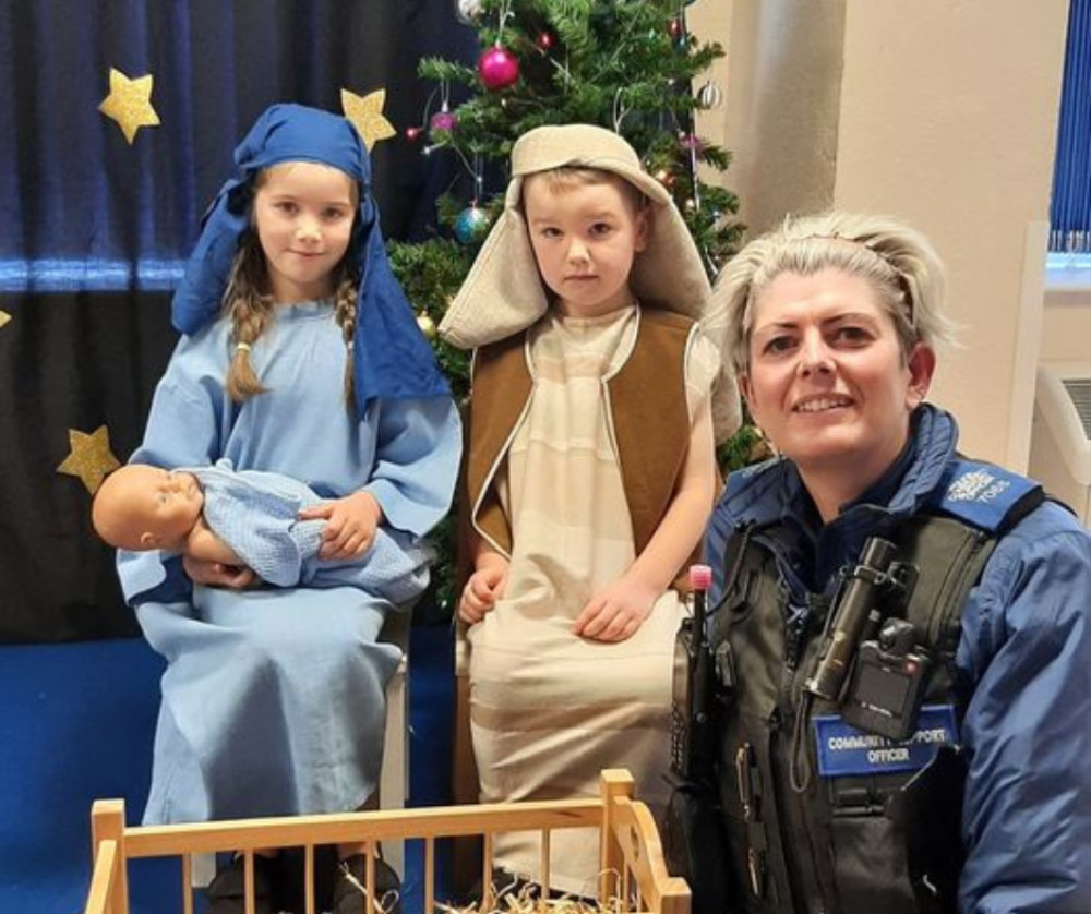 Fostering community spirit, the school's nativity event bridges connections between students and local law enforcement