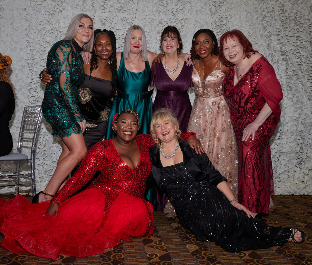 The Alpha Omega Women Peace and Security (WPS) Foundation calendar girls re-enact their front cover pose to the delight of dinner guests at Crewe Hall (Jan Roberts). 