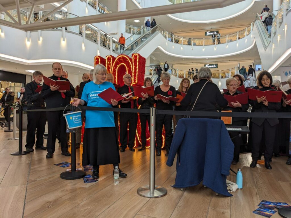 Kingston Choral Society singing to Bentall Centre shoppers. (Photo: Supplied)