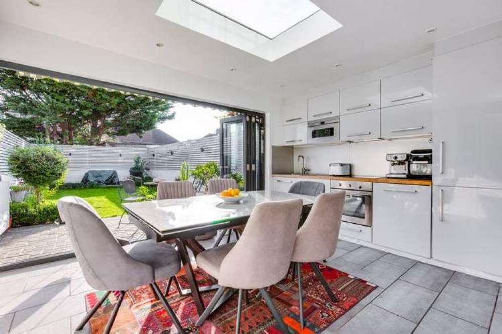 The stunning open-plan kitchen and diner looks out onto the garden (Image: Laurels)