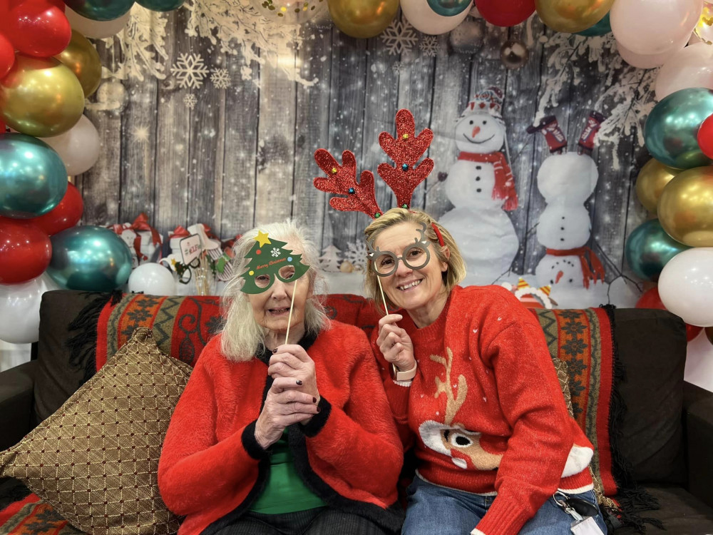 Belong Crewe resident, Kyra Wolfe, enjoys the festivities with community support worker, Donna Woolrich (Nub News).