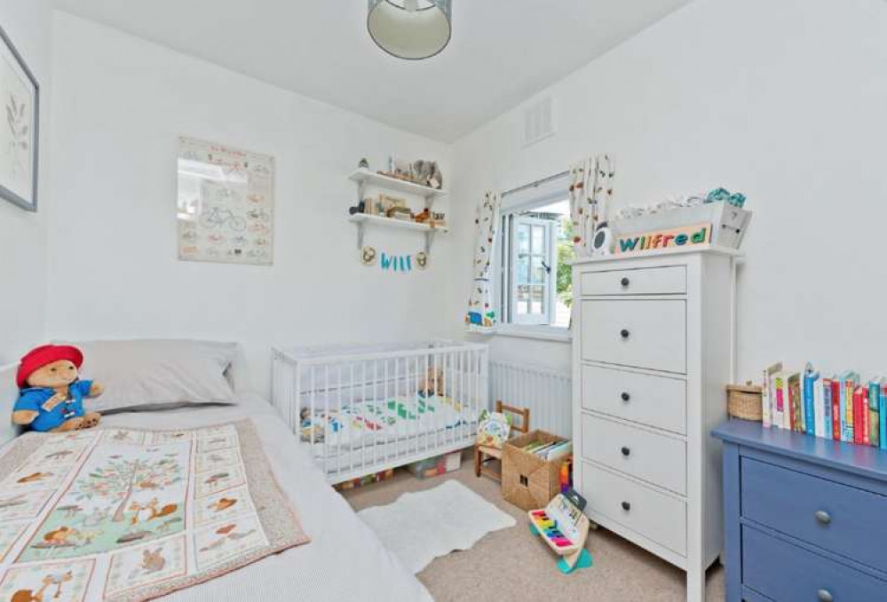 The main bedroom, also with fireplace (Image: Seymours)