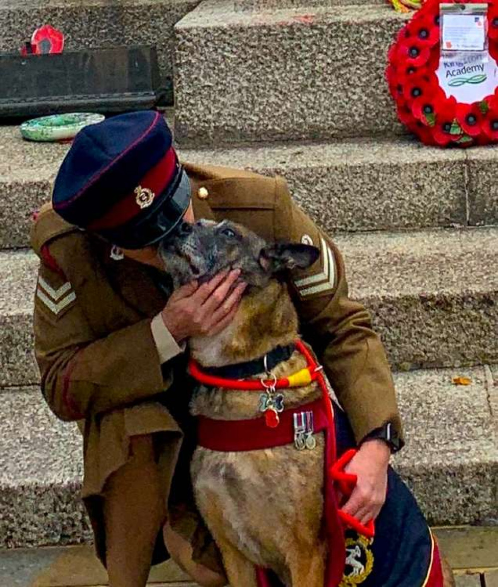 Army medic Angie McDonnell and Vidar the Belgian Malinois at Kingston war memorial yesterday (Photo: Mick McDonnell)