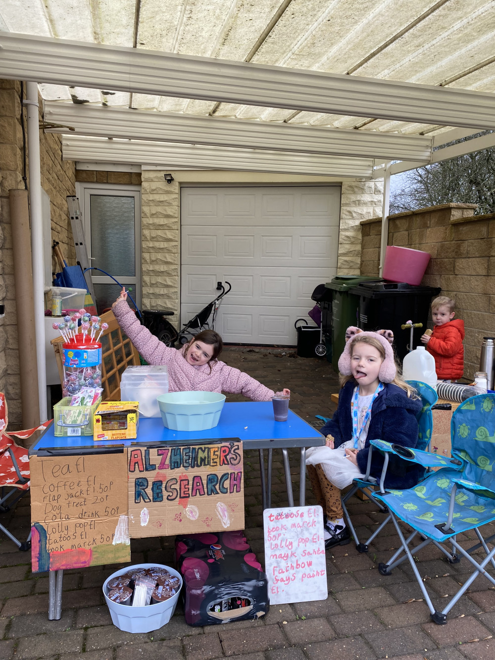 Olivia Slingo, 8, and her sister Robin, 5, and their brother Levi, 3.  