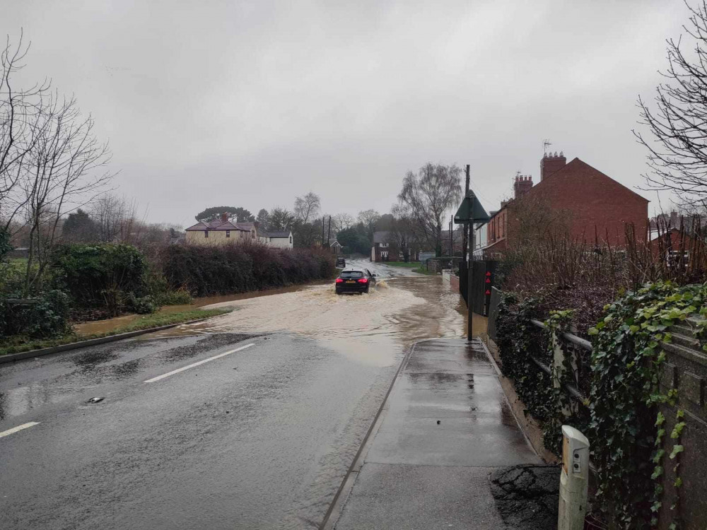 Last week's flood has resulted in some standing water and ice on the roads. Image credit: Nub News. 