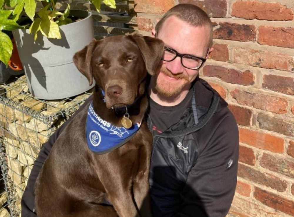 Local lad Martin and his family have worked hard to socialise 'support dogs', who will go on to help adults and children with disabilities (Image - Support Dogs)