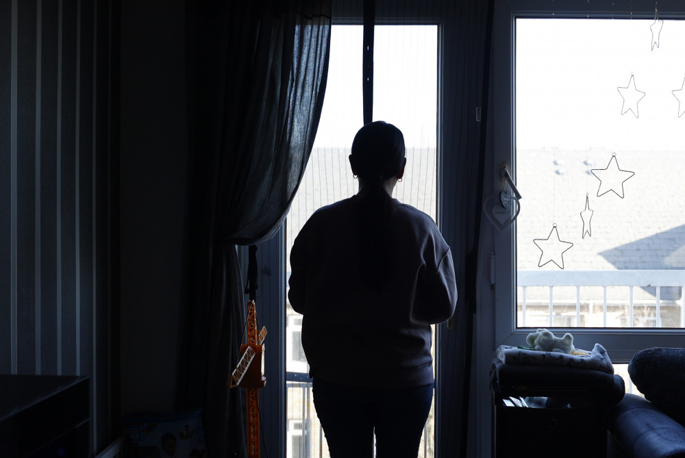 Katie, 38, in the two-bed flat in Kew, Richmond. (Photo Credit: Facundo Arrizabalaga/MyLondon).