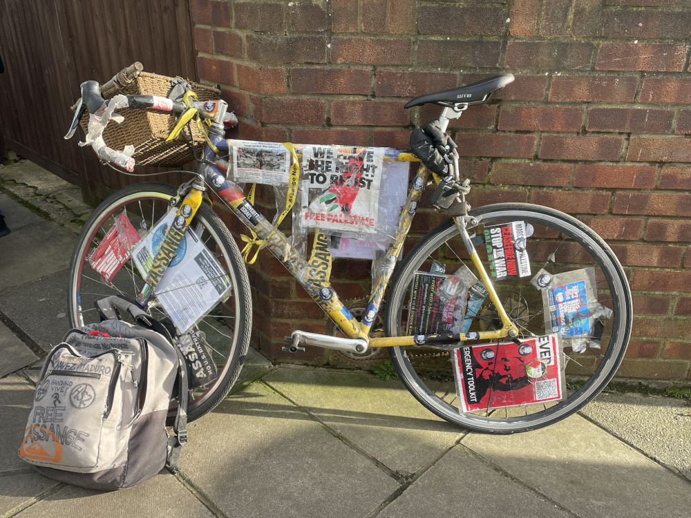 A bike covered in signs. (Photo Credit: Heather Nicholls).