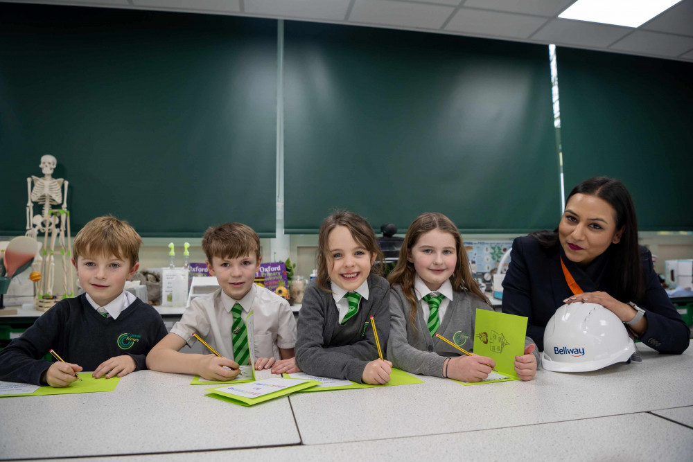 Bellway Eastern Counties Neelam Shah with pupils from Catmose Primary School. Image credit: Bellway.