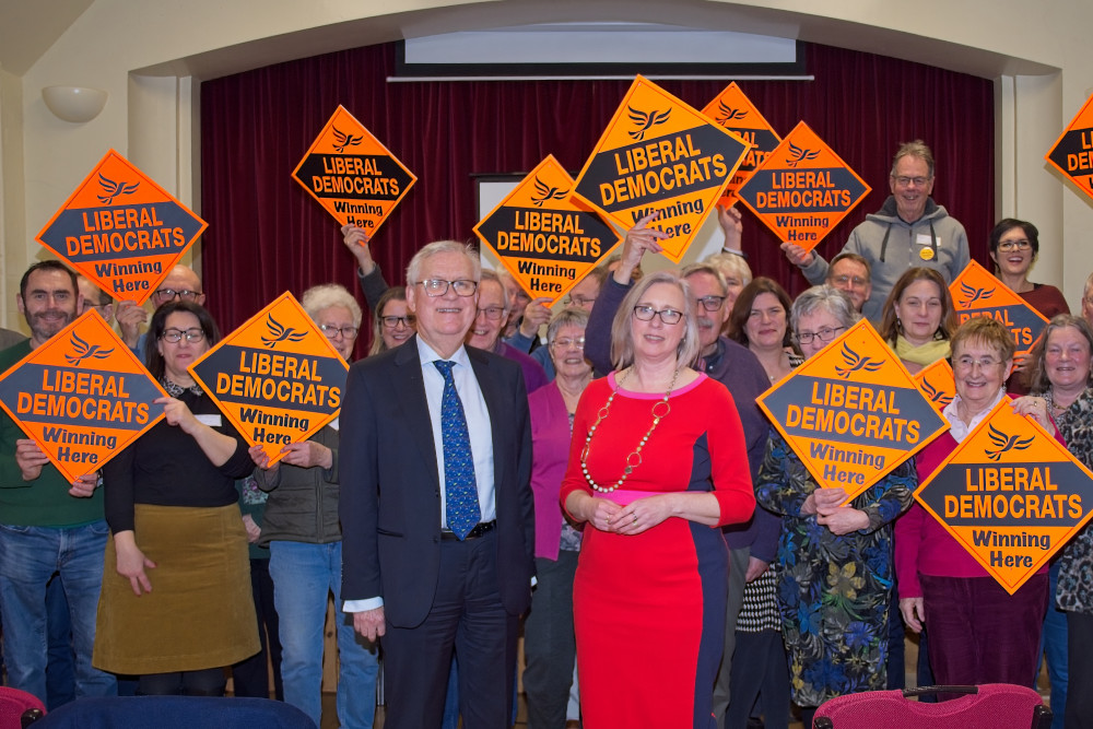 Jenny Wilkinson (right) with Lord ‘Dick’ Newby (left) surrounded by campaign supporters (image supplied)