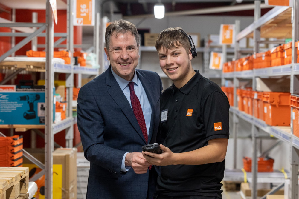 Photo of Mayor Dan Norris meeting an apprentice at B&Q - another Share to Support funder, image WECA