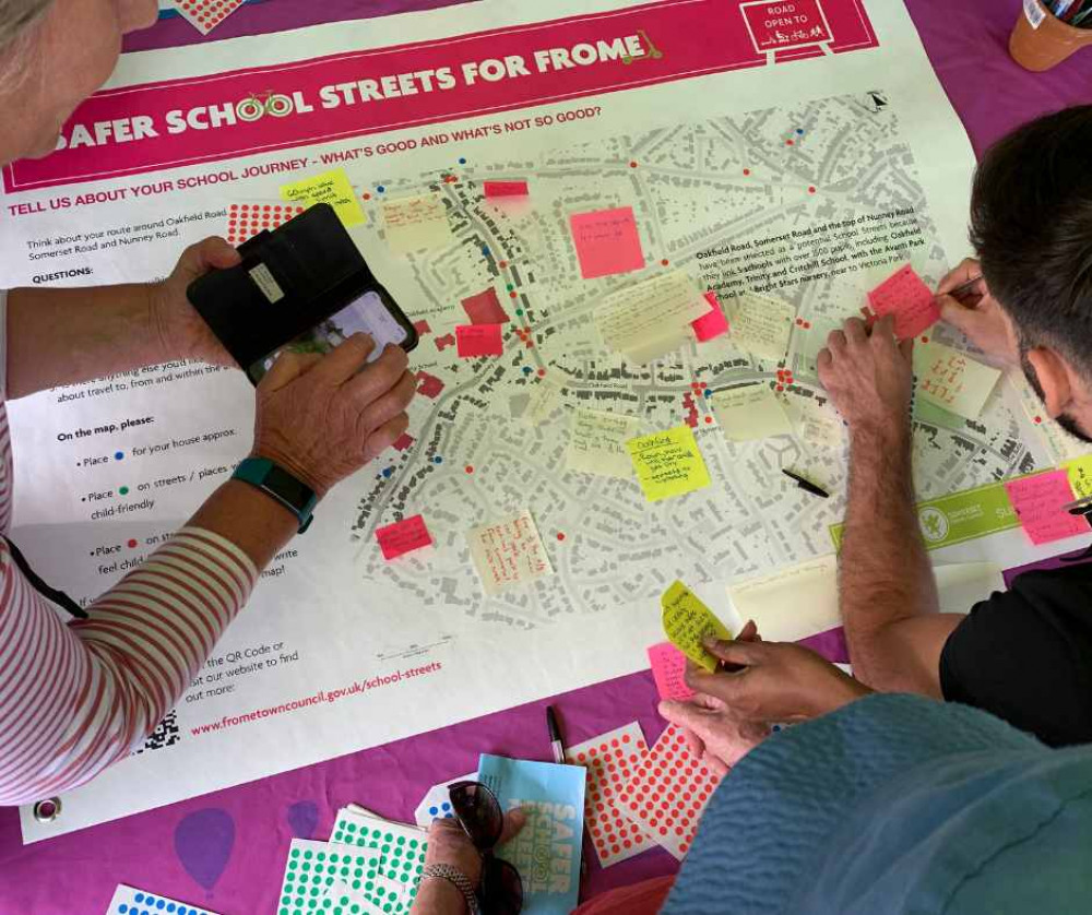 People sharing opinions at a Safer School Streets engagement event, image Frome Town Council