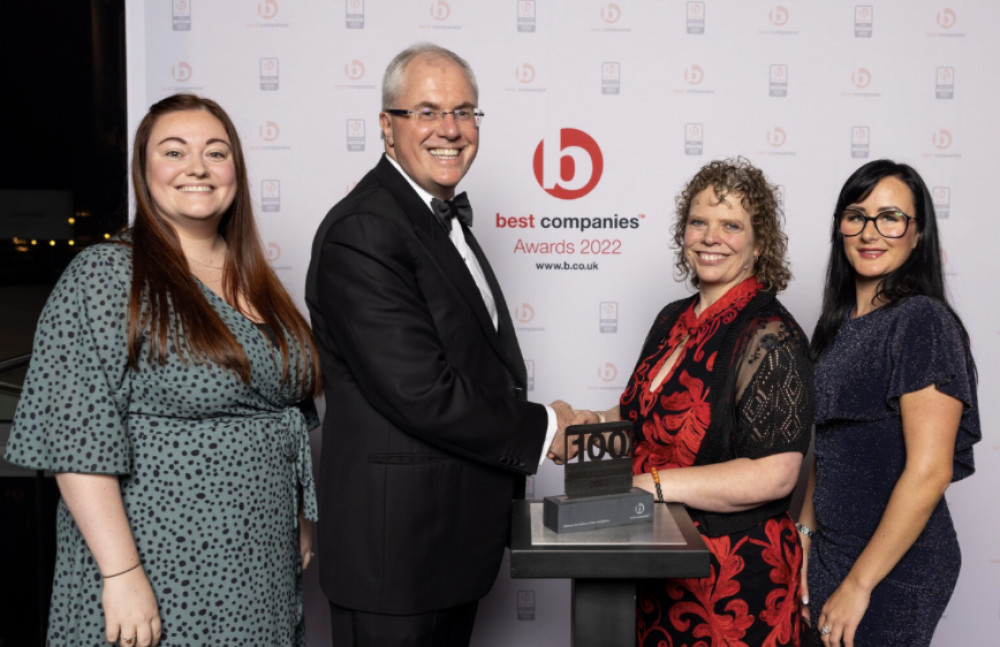 Congratulations to Crossroads Care who have been included in the 100 Best Companies to Work list for fourth year in a row. PICTURE: The victorious Crossroads team shown after picking up last year's prestigious award. 