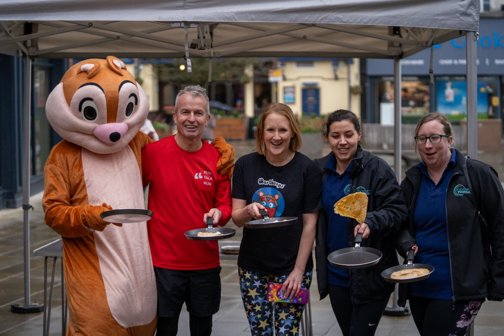 Top that! Letchworth's Pancake Day Race has been hailed as a 'flippin' success. CREDIT: Bezza Visuals