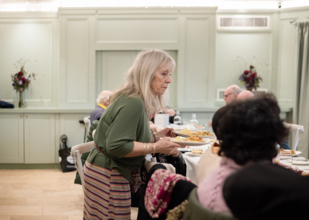 Angie Serving. (Photo Credit: Shepherd's Star). 