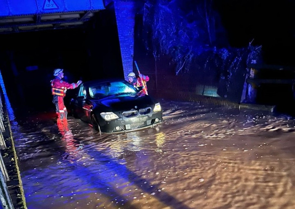 The BMW was stuck under the railway bridge on Salters Lane (image via Henley Fire Station) The BMW was stuck under the railway bridge on Salters Lane (image via Henley Fire Station)