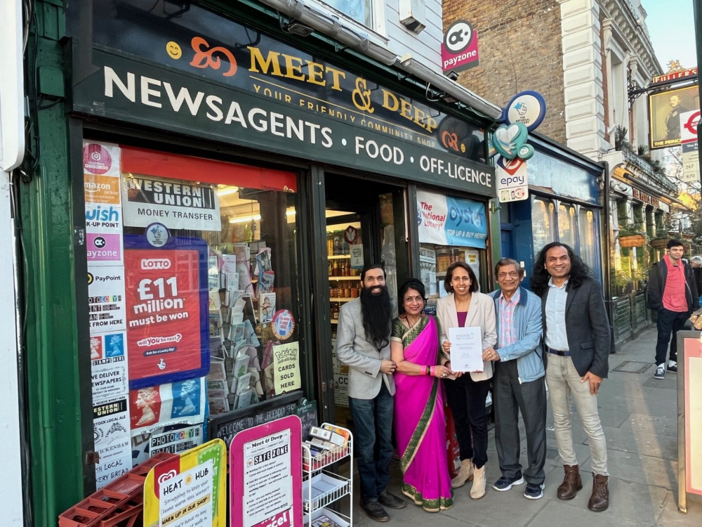 Twickenham MP Munira Wilson presents Points of Light award to Twickenham newsagents. (Photo Credit: Munira Wilson MP).