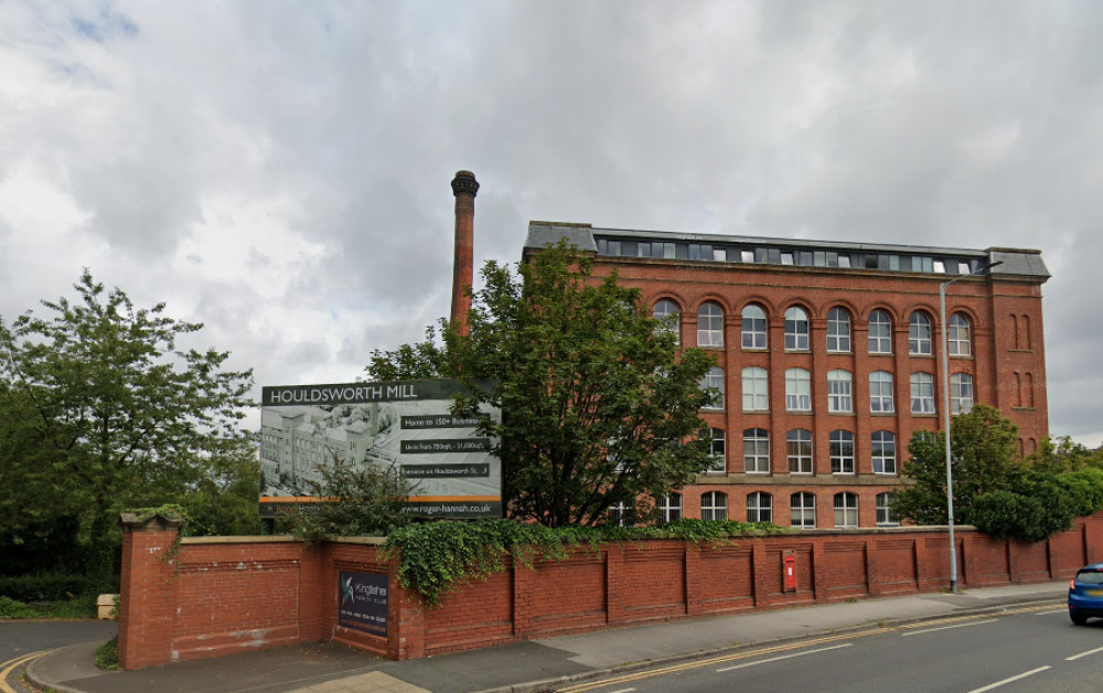 A passenger died when a vehicle collided with the perimeter wall surrounding Houldsworth Mill, Reddish (Image - Google Maps)