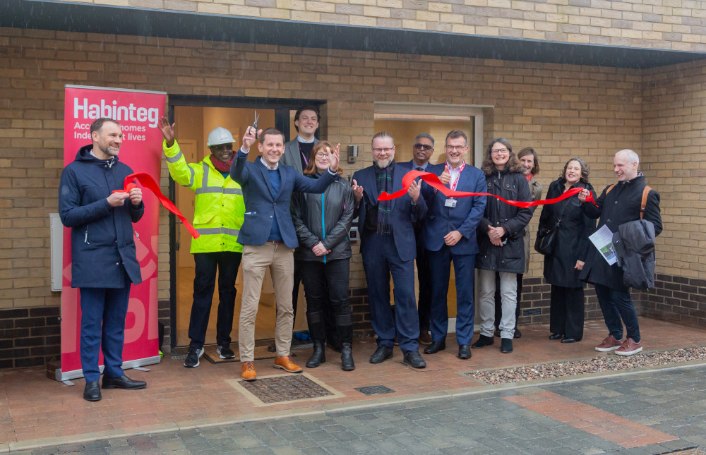 Hounslow councillors at former Brentside garage site ribbon cutting for new homes (credit: Hounslow Council).