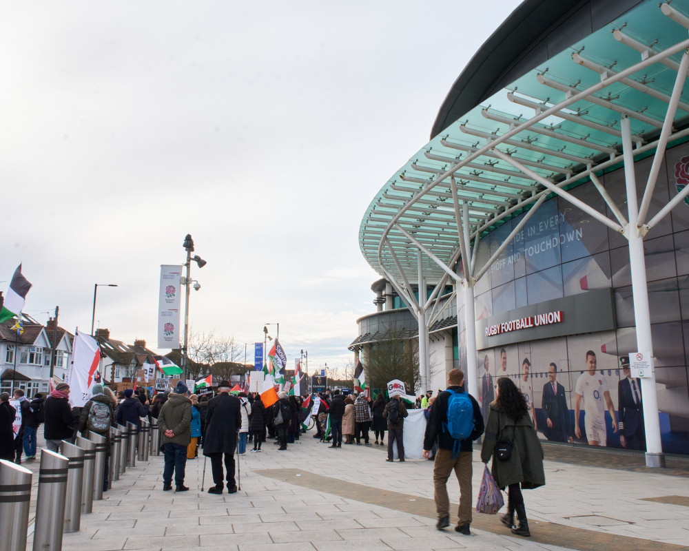 A view of the protest outside of the stadium. (Photo Credit: Oliver Monk).