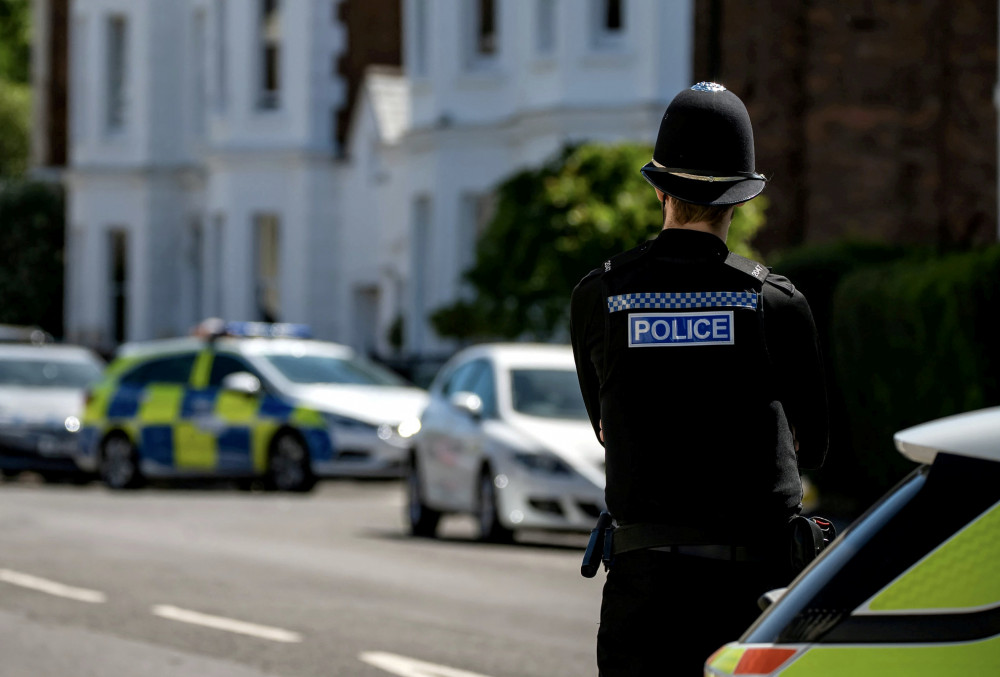 Warwickshire Police visited the property on Emscote Road today - March 5 (image via SWNS)