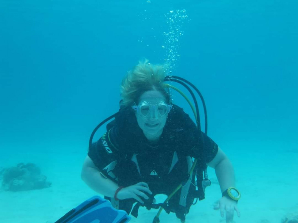 Hannah who loves scuba diving has opened her own counselling business.  (Photo: Hannah Bolton)