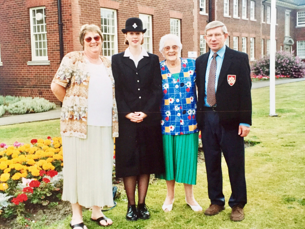 Helen with her parents and grandmother at her prison service graduation ceremony (image supplied)