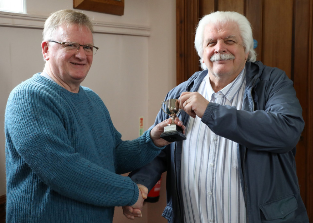 Howard Corlett presented Mike Stone with the photography trophy.