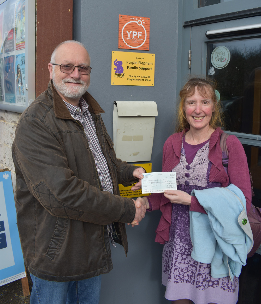 Martin Honor of Forest of Selwood Masonic Lodge presenting a cheque to Sue Willis , image Purple Elephant